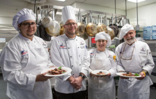 HACC culinary arts students, from the left, Jacob Fedetz, Angelika Tayac and Michael Hosta, along with Chef Chad Brumbaugh (second from left) recently participated in a demonstration on how to prepare Pekin duck with representatives from Joe Jurgielewicz & Son on Sept. 5.